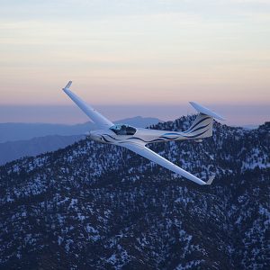 Glider over mountains